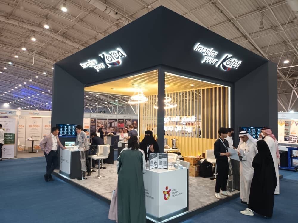 Our team with a client on the exhibition floor